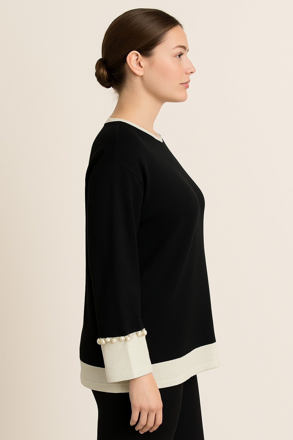 Blusa perline su manica